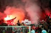 Nice soccer fans light flares before the start of the French League One soccer match between Nice and Marseille at the Allianz Riviera stadium in Nice, southern France, Wednesday, Aug. 28, 2019. (AP Photo/Daniel Cole)