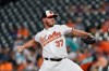 Baltimore Orioles pitcher Dylan Bundy delivers against the Los Angeles Dodgers in the first inning of a baseball game Thursday, Sept. 12, 2019, in Baltimore. (AP Photo/Gail Burton)