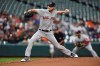 Boston Red Sox pitcher Chris Sale throws to a Baltimore Orioles batter during the first inning of a baseball game Wednesday, May 8, 2019, in Baltimore. (AP Photo/Gail Burton)