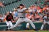 Cleveland Indians pitcher Mike Clevinger throws in the first inning of a baseball game against the Baltimore Orioles, Friday, June 28, 2019, in Baltimore. (AP Photo/Gail Burton)