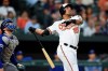 Baltimore Orioles' Anthony Santander follows through on an RBI double against the Toronto Blue Jays during the fourth inning of a baseball game Tuesday, June 11, 2019, in Baltimore. (AP Photo/Gail Burton)