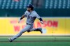 Tampa Bay Rays' Kevin Kiermaier hits the brakes after touching second base on a double off Baltimore Orioles starting pitcher Dylan Bundy during the first inning of a baseball game Friday, July 12, 2019, in Baltimore. (AP Photo/Julio Cortez)