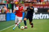 Real Madrid forward Lucas Vazquez, right, battles for the ball against Arsenal defender Sead Kolasinac, left, during the first half of an International Champions Cup soccer match, Tuesday, July 23, 2019, in Landover, Md. (AP Photo/Nick Wass)