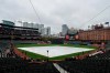 A sign advises that the baseball game between the Baltimore Orioles and the Tampa Bay Rays will be delayed by inclement weather, and a tarp covers the infield, Sunday, May 5, 2019, in Baltimore. (AP Photo/Tommy Gilligan)