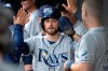 Tampa Bay Rays' Brandon Lowe celebrates with teammates in the dugout after scoring during the first inning of the team's baseball game against the Baltimore Orioles, Friday, May 3, 2019, in Baltimore. (AP Photo/Tommy Gilligan)