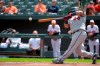 Minnesota Twins Willians Astudillo hits an RBI double to score Jorge Polanco (11) in the first inning of a baseball game against the Baltimore Orioles, Sunday, April 21, 2019, in Baltimore. (AP Photo/Will Newton)