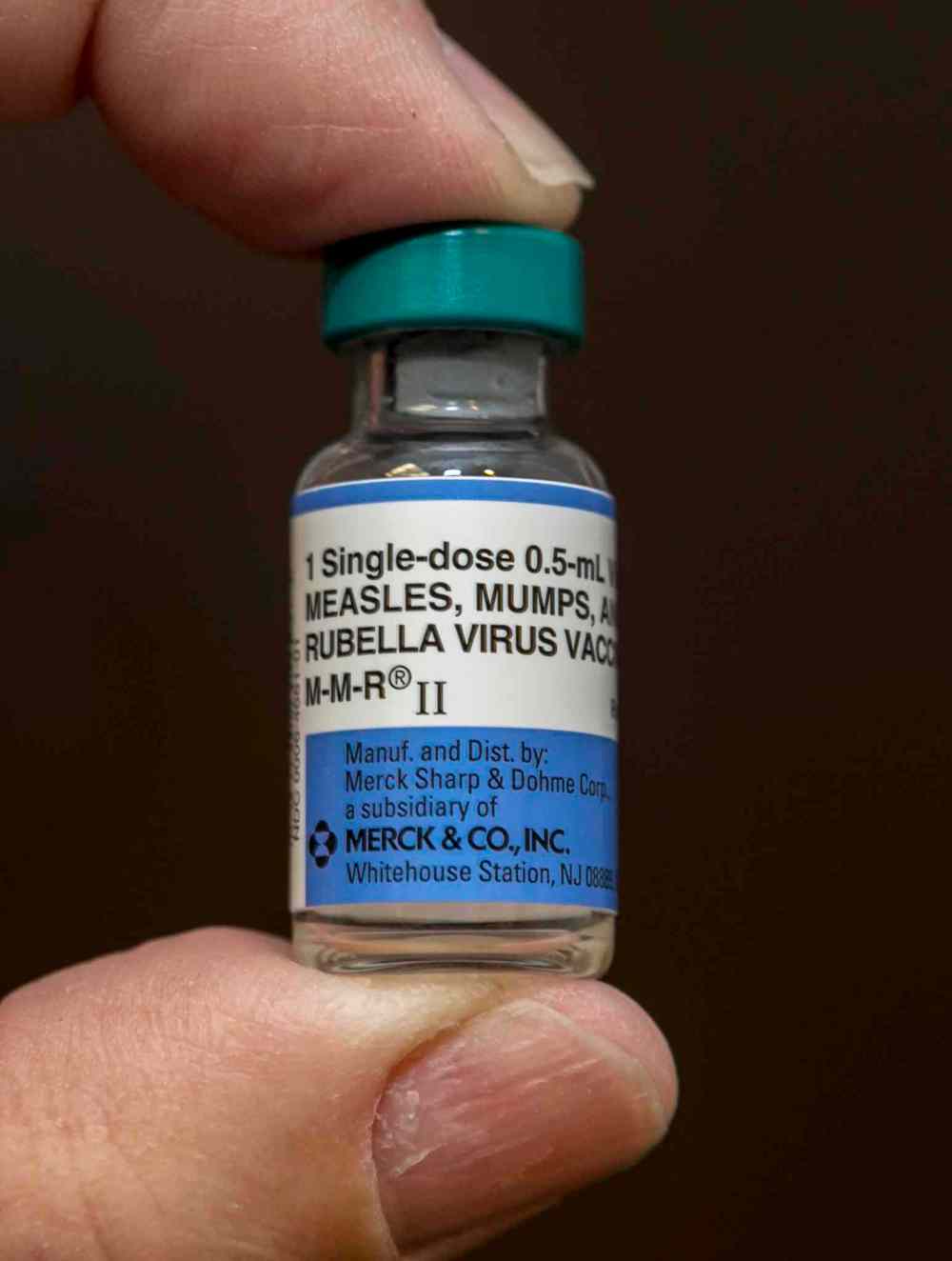 Damian Dovarganes / The Associated Press Files
A single-dose vial of the measles-mumps-rubella virus vaccine live, or MMR vaccine.