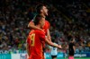 Spain's Dani Olmo jubilates after scoring the goal (2-0) with teammate Fabian Ruiz Pena during the Uefa European Under-21 Championship 2019 - Finals between Spain and Germany in Udine, Italy, Sunday, June 30, 2019. (Gabriele Menis/ANSA via AP)