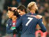 PSG's Edinson Cavani, center reacts after scoring the opening goal with his teammates PSG's Thilo Kehrer, lefty, and PSG's Eric Maxim Choupo-Moting, right, during the French Cup soccer match between Paris Saint Germain and Strasbourg at the Parc des Princes stadium in Paris, Wednesday, Jan. 23, 2019. (AP Photo/Michel Euler)