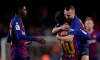 FC Barcelona's Lionel Messi celebrates after scoring with his teammate Jordi Alba during the Spanish La Liga soccer match between FC Barcelona and Celta Vigo at the Camp Nou stadium in Barcelona, Spain, Saturday, Dec. 22, 2018. (AP Photo/Manu Fernandez)