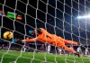 FC Barcelona's Lionel Messi shoots to score his side's opening goal from the penalty spot during the Spanish La Liga soccer match between FC Barcelona and Valladolid at the Camp Nou stadium in Barcelona, Spain, Saturday, Feb. 16, 2019. (AP Photo/Manu Fernandez)