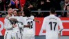 Real Madrid's Benzema, second left, celebrates with teammates after scoring during a Spanish Copa del Rey soccer match between Girona and Real Madrid at the Montilivi stadium in Girona, Spain, Thursday, Jan. 31, 2019. (AP Photo/Manu Fernandez)