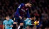 FC Barcelona's Gerard Pique, left, heads for the ball with Celta Vigo's Sofiane Boufal during the Spanish La Liga soccer match between FC Barcelona and Celta Vigo at the Camp Nou stadium in Barcelona, Spain, Saturday, Dec. 22, 2018. (AP Photo/Manu Fernandez)