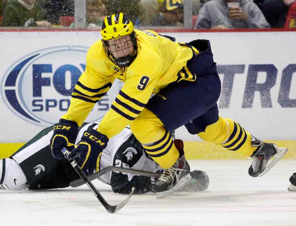 Duane Burleson / The Associated Press Files
Michigan's Andrew Copp (9) will join the Winnipeg Jets
