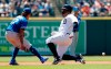 Detroit Tigers' Miguel Cabrera beats the throw to Kansas City Royals second baseman Adalberto Mondesi for a double during the first inning of a baseball game, Sunday, May 5, 2019, in Detroit. (AP Photo/Carlos Osorio)