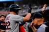 Cleveland Indians' Jason Kipnis is greeted in the dugout after a solo home run during the second inning of a baseball game against the Detroit Tigers, Wednesday, Aug. 28, 2019, in Detroit. (AP Photo/Carlos Osorio)