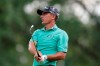 Charles Howell III watches his drive on the ninth tee during the second round of the Rocket Mortgage Classic golf tournament, Friday, June 28, 2019, in Detroit. (AP Photo/Carlos Osorio)