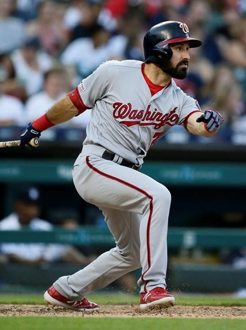 Washington Nationals' Adam Eaton singles to drive in Victor Robles against the Detroit Tigers during the fifth inning of a baseball game Friday, June 28, 2019, in Detroit. (AP Photo/Duane Burleson)