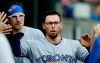 Toronto Blue Jays' Eric Sogard celebrates after scoring on a wild pitch by Detroit Tigers' Jordan Zimmermann during the first inning of a baseball game, Friday, July 19, 2019, in Detroit. (AP Photo/Duane Burleson)