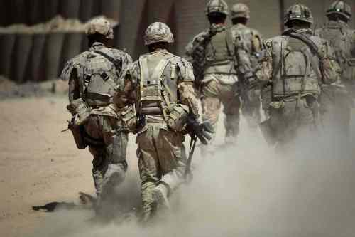 Canadian soldiers patrol southwest of Kandahar, Afghanistan. (Anja Niedringhaus / The Associated Press files)