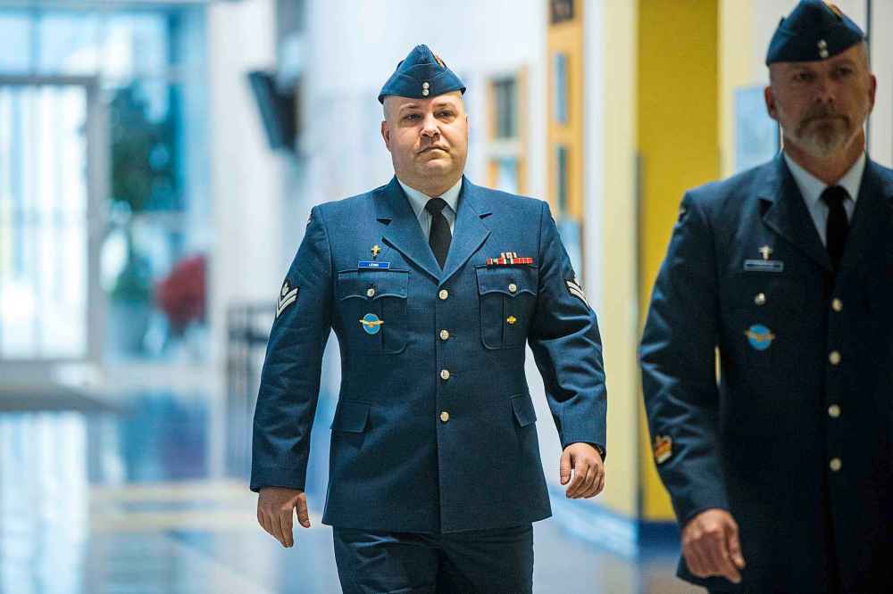 MIKAELA MACKENZIE / WINNIPEG FREE PRESS
Master Corporal Lewis walks to his court martial at the Canadian Armed Forces base in Winnipeg on Monday.