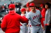 Los Angeles Angels' Shohei Ohtani smiles with manager Brad Ausmus, left, before a baseball game against the Detroit Tigers in Detroit, Tuesday, May 7, 2019. (AP Photo/Paul Sancya)