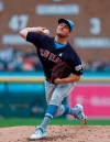 Cleveland Indians pitcher Trevor Bauer throws against the Detroit Tigers in the first inning of a baseball game in Detroit, Sunday, June 16, 2019. (AP Photo/Paul Sancya)