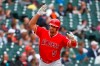Los Angeles Angels' Albert Pujols tosses his bat after hitting a solo home run in the third inning of a baseball game against the Detroit Tigers in Detroit, Thursday, May 9, 2019. The home run was his 2,000th career RBI. (AP Photo/Paul Sancya)
