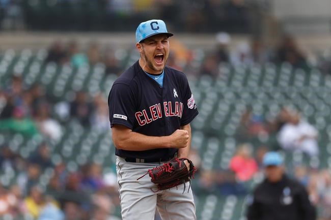 Cleveland Indians pitcher Trevor Bauer reacts to striking out Detroit Tiger's Brandon Dixon in the ninth inning of a baseball game in Detroit, Sunday, June 16, 2019. Cleveland won 8-0. (AP Photo/Paul Sancya)