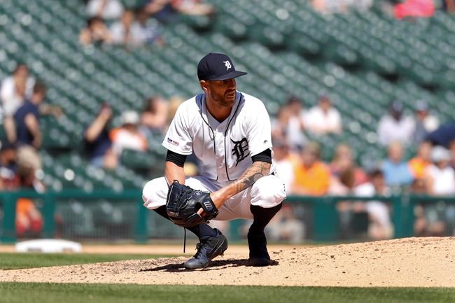 Detroit Tigers relief pitcher Shane Greene reacts after Miami Marlins' Garrett Cooper hit a grand slam in the ninth inning of a baseball game in Detroit, Thursday, May 23, 2019. Miami won 5-2. (AP Photo/Paul Sancya)