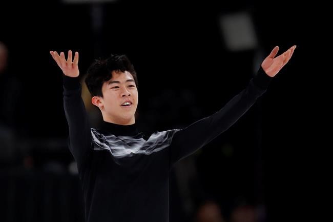 Nathan Chen acknowledges the audience after performing the men's free skate at the U.S. Figure Skating Championships, Sunday, Jan. 27, 2019, in Detroit. (AP Photo/Paul Sancya)