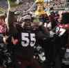 Bruce Newman / Associated Press files
Mississippi State's Quentin Saulsberry (55) celebrates his team's 41-27 win over Mississippi after a 2009 NCAA college football game in Starkville, Miss.