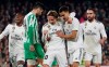 Real Madrid's Modric, center, celebrates after scoring against Betis during La Liga soccer match between Betis and Real Madrid at the Villamarin stadium in Seville, Spain, Sunday, January 13, 2019. (AP Photo/Miguel Morenatti)
