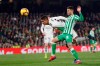 Real Madrid's Varane, left, andBetis' Sanabria, fight for the ball during La Liga soccer match between Betis and Real Madrid at the Villamarin stadium in Seville, Spain, Sunday, January 13, 2019. (AP Photo/Miguel Morenatti)