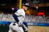 New York Yankees' Gleyber Torres celebrates as he runs the bases after hitting a home run during the second inning in Game 3 of a baseball American League Division Series against the Minnesota Twins, Monday, Oct. 7, 2019, in Minneapolis. (AP Photo/Bruce Kluckhohn)