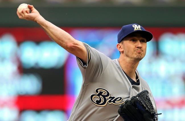 Milwaukee Brewers pitcher Zach Davies throws against the Minnesota Twins in the first inning of a baseball game, Tuesday, May 28, 2019, in Minneapolis. (AP Photo/Jim Mone)