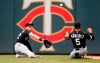 A double by Minnesota Twins' Jonathan Schoop drops between Chicago White Sox second baseman Yolmer Sanchez, right, and right fielder Charlie Tilson as they both tried to field it in the fourth inning of a baseball game Saturday, May 25, 2019, in Minneapolis. (AP Photo/Jim Mone)