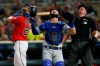 Minnesota Twins' Eddie Rosario, left, Kansas City Royals catcher Nick Dini, center and plate umpire Sam Holbrook watch Rosario's popup before Dini made the catch in the first inning of a baseball game Friday, Sept. 20, 2019, in Minneapolis. (AP Photo/Jim Mone)