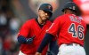 Minnesota Twins' C.J. Cron, left, rounds the bases on a solo home run off Baltimore Orioles' pitcher Alex Cobb in the first inning of a baseball game Friday, April 26, 2019, in Minneapolis. (AP Photo/Jim Mone)