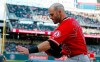Los Angeles Angels' Tommy La Stella is congratulated in the dugout after scoring on a Mike Trout single off Minnesota Twins pitcher Jose Berrios in the first inning of a baseball game Monday, May 13, 2019, in Minneapolis. (AP Photo/Jim Mone)