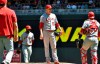 Los Angeles Angels pitcher Trevor Cahill, center, waits to be pulled by manager Brad Ausmus, left, after giving up a walk to Minnesota Twins' C.J. Cron in the fifth inning of a baseball game Wednesday, May 15, 2019, in Minneapolis. (AP Photo/Jim Mone)