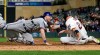 Minnesota Twins' C.J. Cron, right, is tagged out at the plate by Toronto Blue Jays catcher Danny Jansen for the final out to end the baseball game, Tuesday, April 16, 2019, in Minneapolis. The Blue Jays won 6-5. (AP Photo/Jim Mone)