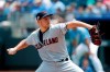 Cleveland Indians pitcher Trevor Bauer throws against the Kansas City Royals in the first inning of a baseball game at Kauffman Stadium in Kansas City, Mo., Sunday, July 28, 2019. (AP Photo/Colin E. Braley)