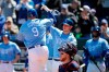 Kansas City Royals' Lucas Duda (9) celebrates with Ryan O'Hearn (66) after hitting a three-run home run in the second inning of a baseball game against the Cleveland Indians at Kauffman Stadium in Kansas City, Mo., Sunday, April 14, 2019. (AP Photo/Colin E. Braley)