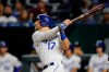 Kansas City Royals' Hunter Dozier hits a solo home run to tie the game in the seventh inning of a baseball game against the Baltimore Orioles at Kauffman Stadium in Kansas City, Mo., Saturday, Aug. 31, 2019. (AP Photo/Colin E. Braley)