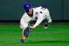 Kansas City Royals center fielder Bubba Starling makes a diving catch on a fly ball hit by Cleveland Indians' Mike Freeman in the sixth inning of a baseball game at Kauffman Stadium in Kansas City, Mo., Friday, July 26, 2019. (AP Photo/Colin E. Braley)