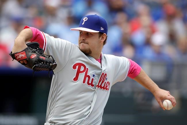 Philadelphia Phillies starting pitcher Cole Irvin throws during the first inning of a baseball game against the Kansas City Royals, Sunday, May 12, 2019, in Kansas City, Mo. (AP Photo/Charlie Riedel)