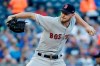 Boston Red Sox starting pitcher Chris Sale throws during the first inning of the team's baseball game against the Kansas City Royals on Wednesday, June 5, 2019, in Kansas City, Mo. (AP Photo/Charlie Riedel)