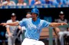 Kansas City Royals' Cheslor Cuthbert looks for an escape as he is caught off base trying to score on a fielder's choice hit into by Jorge Soler during the first inning of a baseball game against the Chicago White Sox Thursday, July 18, 2019, in Kansas City, Mo. Cuthbert was tagged out on the play. (AP Photo/Charlie Riedel)
