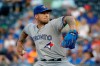 Toronto Blue Jays starting pitcher Sean Reid-Foley throws during the first inning of a baseball game against the Kansas City Royals Tuesday, July 30, 2019, in Kansas City, Mo. (AP Photo/Charlie Riedel)